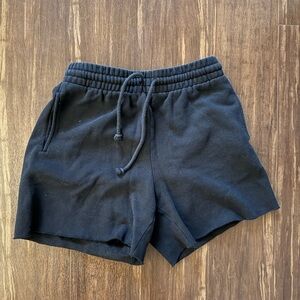 Aritzia TNA cozy AF black drawstring sweat shorts
